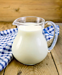 http://preview.cutcaster.com/903820890-Milk-in-glass-jug-with-napkin-on-board.jpg